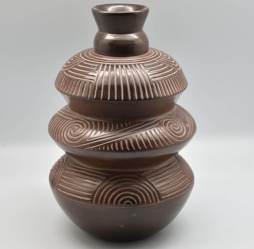 three-tier brown-ware compound bottle with incised line designs