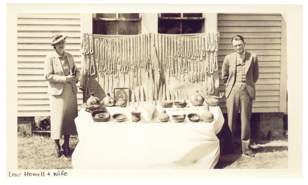 Lear Howell and his wife with looted artifacts from the Spiro and other surrounding sites